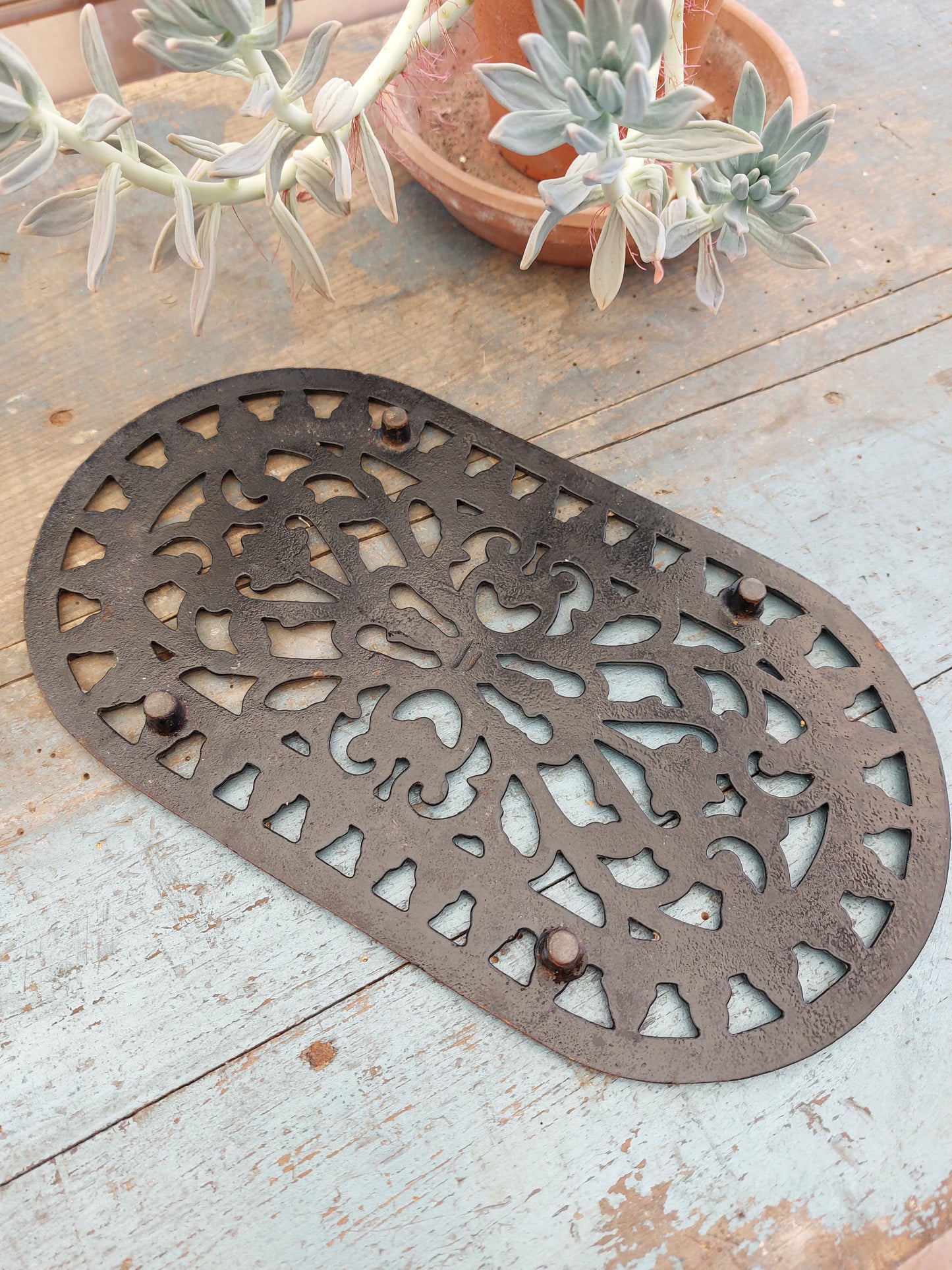 Dessous de plat en fonte