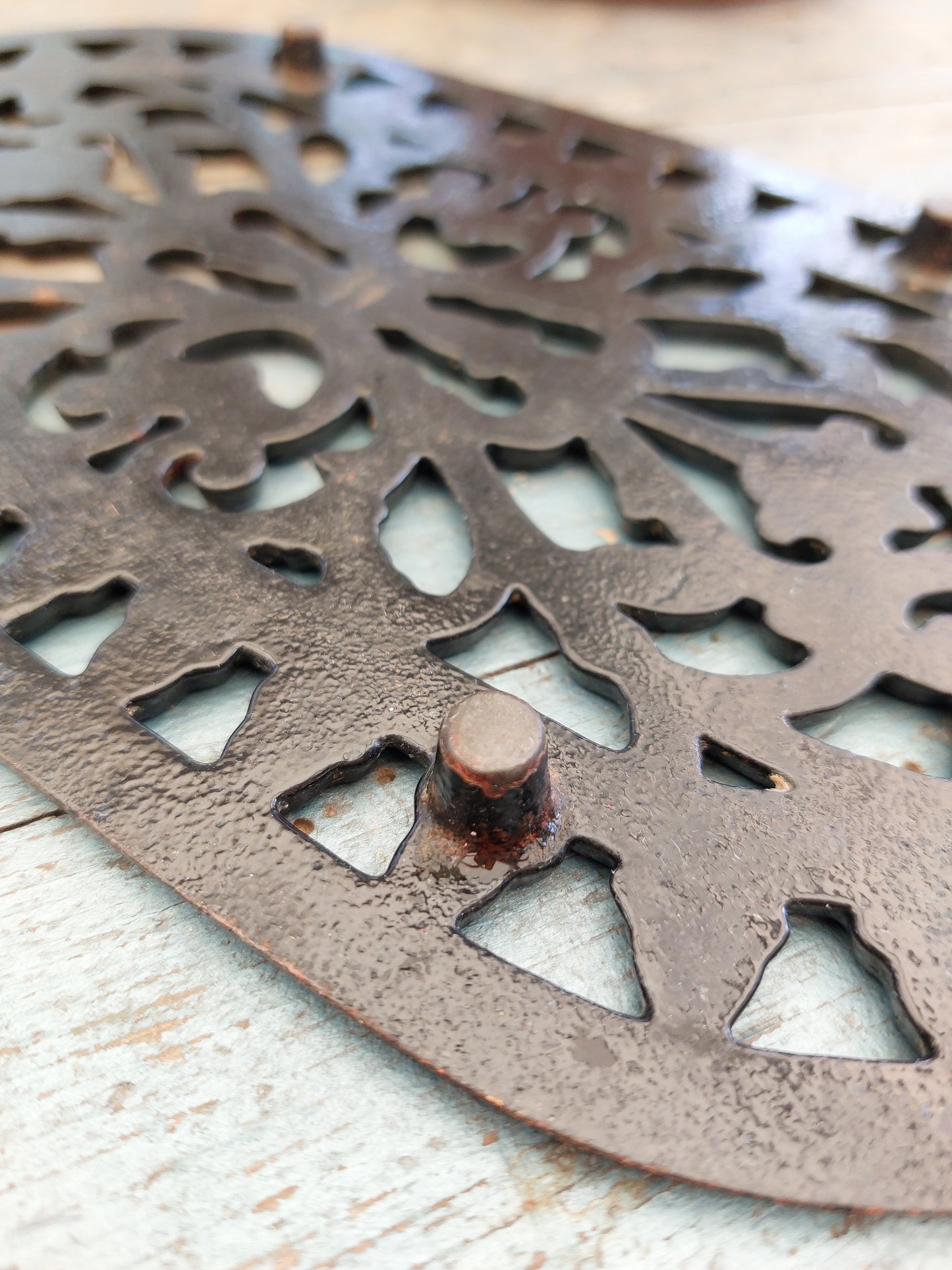 Dessous de plat en fonte