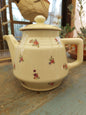 Théière fleurie ancienne