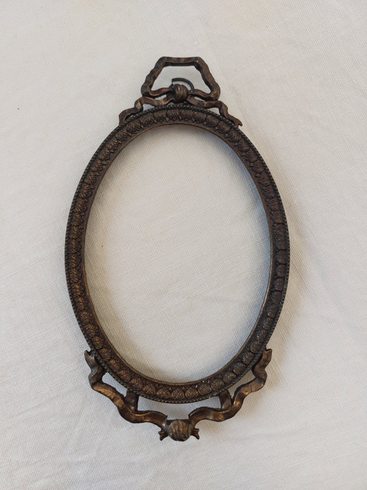 Cadre médaillon de style Louis XVI