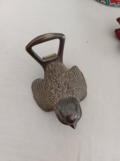 Oiseau décapsuleur