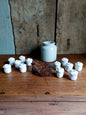 Lot de petits bougeoirs bouton de rose en céramique blanche