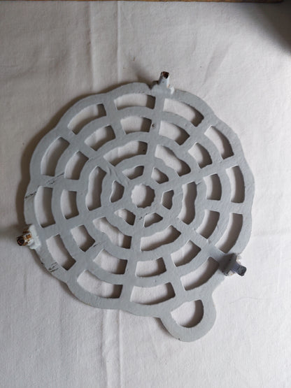 Dessous de plat en fonte